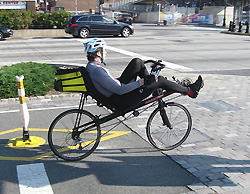 Man riding a recumbent bike