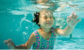Young girl practising under water