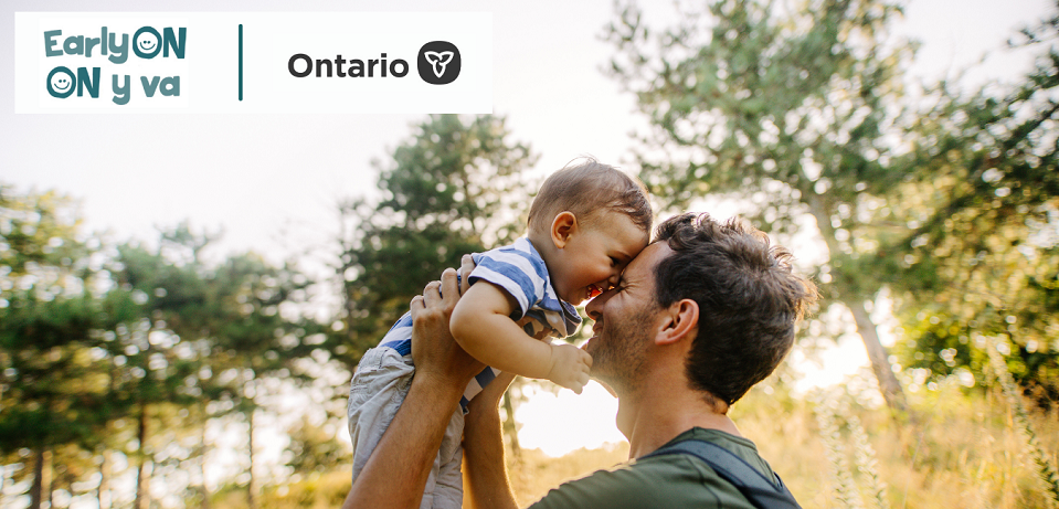 Logos for EarlyON and Ontario over photo of man holding up a baby