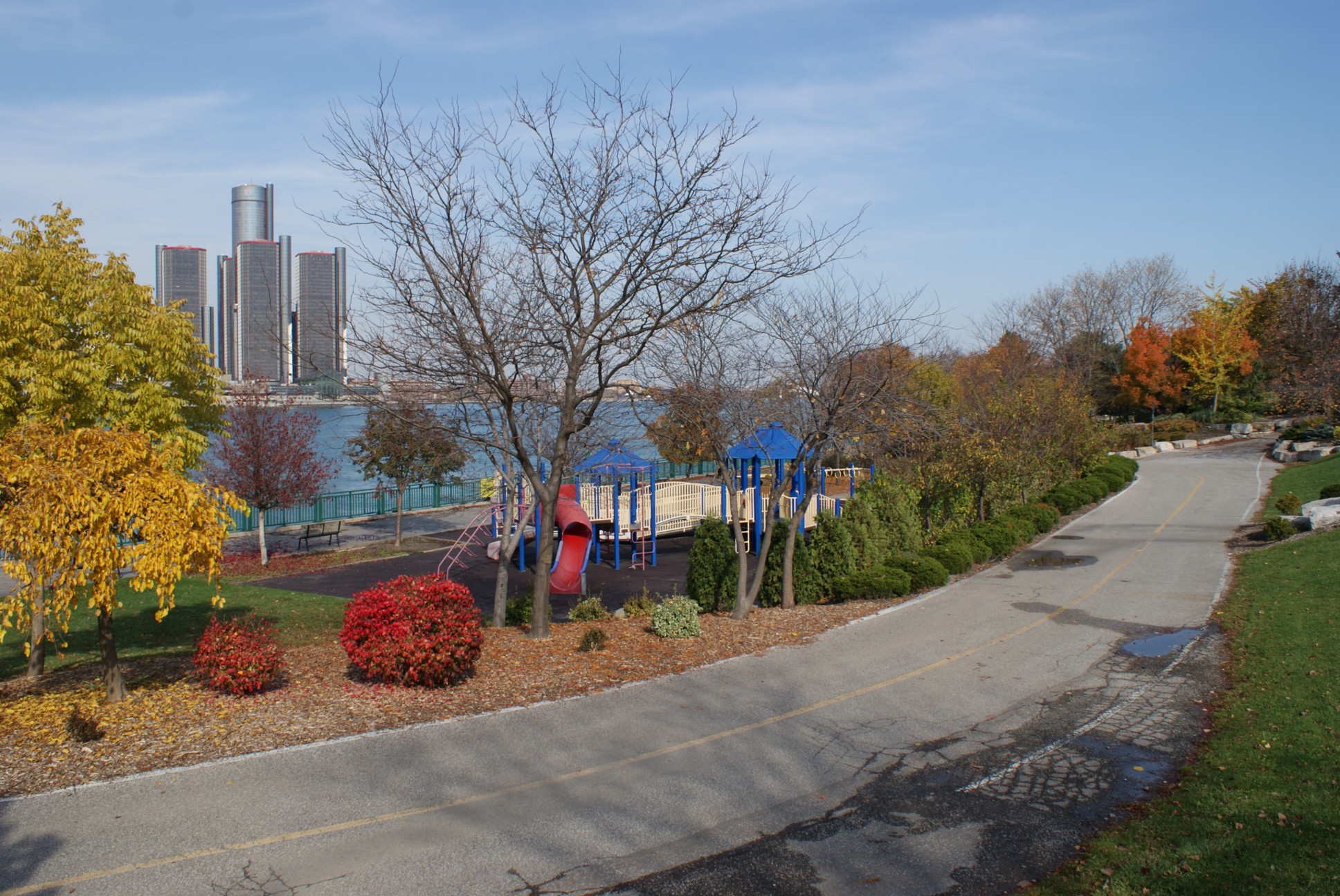 Riverfront pathway and play unit in autumn
