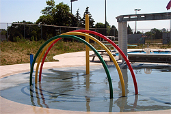 Rainbow apparatus in spray pad