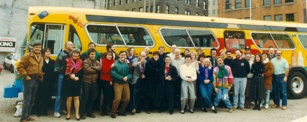 English and French radio staff in front of the CBE 1550 promotional bus, circa 1993. English and French radio staff in front of the CBE 1550 promotional bus, circa 1993.